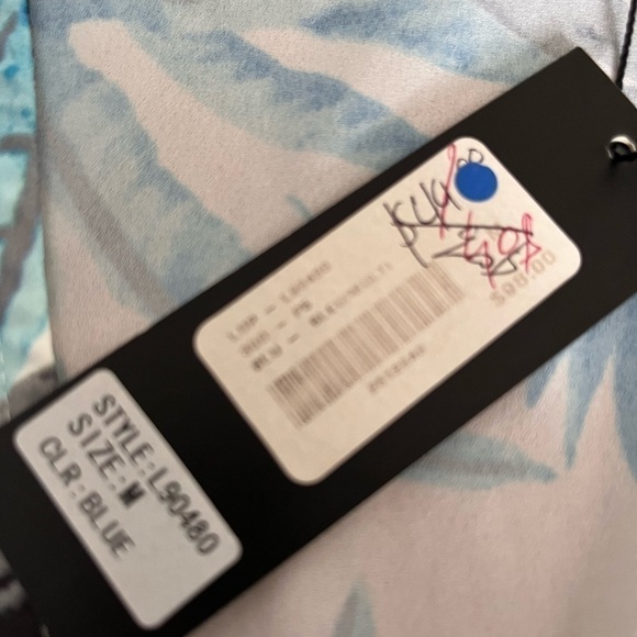 2/40$
Jieru onepiece tropical long sleeve white and bleu size medium - Picture 8 of 14